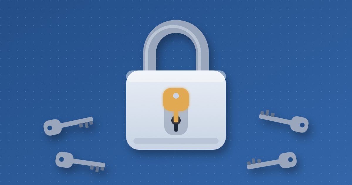 A large padlock with an amber key in its keyhole, surrounded by four gray keys lying scattered on either side.