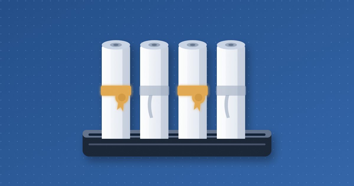Four rolled paper scrolls stand upright in a navy desk tray; two are tied with amber ribbons and seals, two have loose gray ribbons.