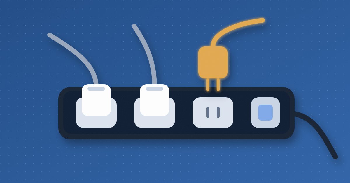 A navy power strip with two white plugs in its sockets and a glowing amber plug lowering into the third socket.