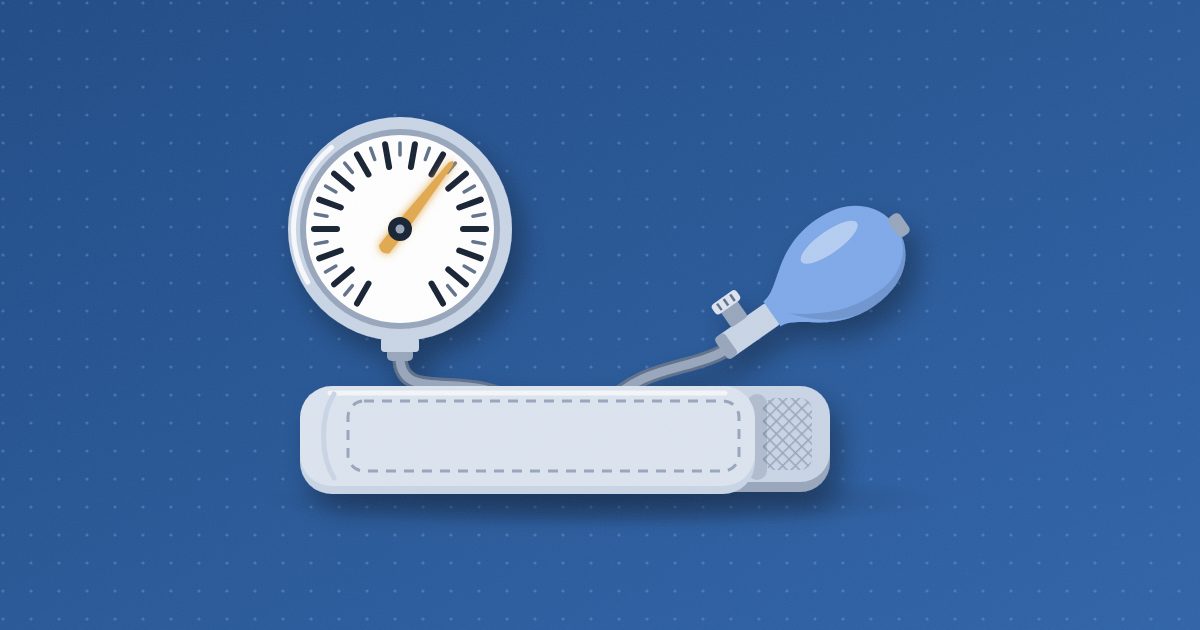 A folded blood pressure cuff with a round aneroid gauge showing an amber needle and a blue squeeze bulb with a release valve, joined by gray tubing.